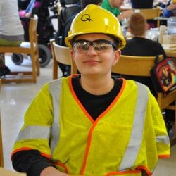 Student celebrating character day in a construction workers uniform